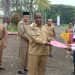 Diguyur Hujan Deras, 757 CPNS Formasi 2021 dan 2024 Tetap Berdiri Tegak Terima SK dari Bupati Sorong